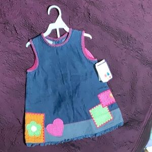 Denim dress with pink bloomers